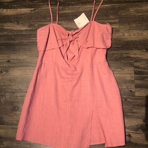 Jessie James Decker Kittenish bow romper mauve.